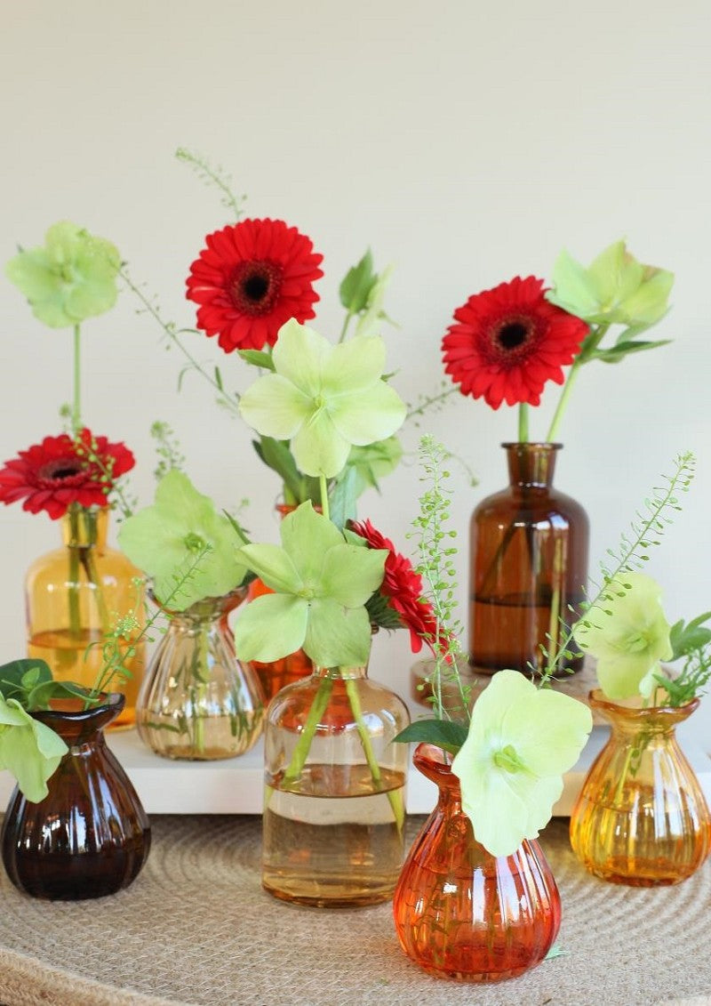 Glazen flessen Ø7 h: 9 cm assorti kleuren (12 stuks) [IFS-29808]